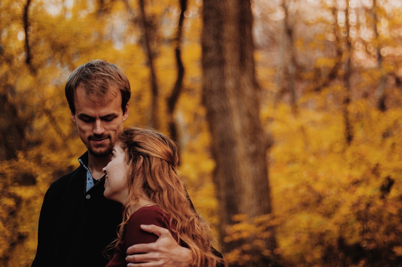 Couple embracing in the forest