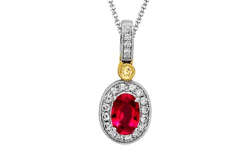 Ruby pendant with a halo setting by Simon G