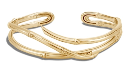A gold cuff from John Hardy features bamboo-inspired designs